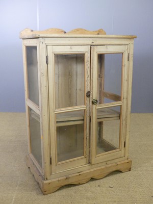 Lot 742 - A rustic pine ledgeback double door glazed...
