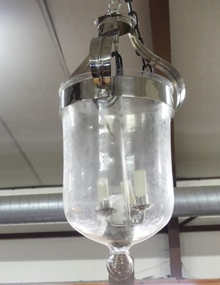 Lot 673 - A contemporary blown glass and metal framed...