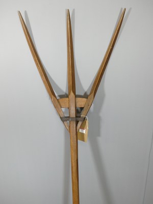 Lot 727 - A vintage stained beech hay fork, length 163cm