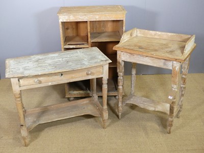 Lot 734 - A rustic Victorian pine single drawer two-tier...