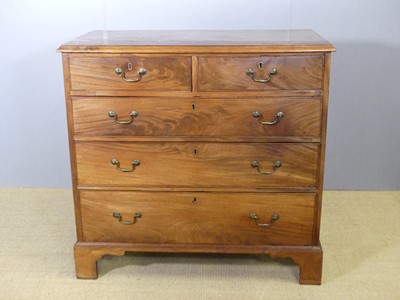 Lot 748 - A George III mahogany squarefront chest of...