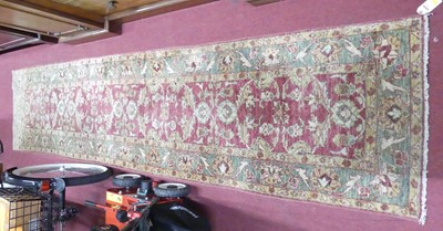 Lot 769 - A Persian woollen red and cream ground Oushak...