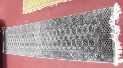 Lot 770 - A Persian woollen jade green ground Bokhara...