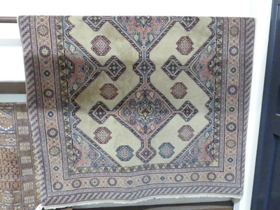 Lot 778 - A Romanian woollen cream and pale ground...