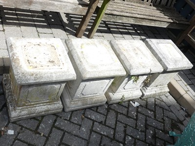 Lot 781 - A set of four reconstituted stone square...