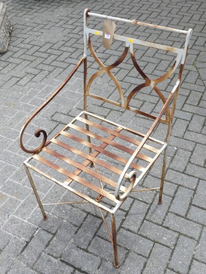 Lot 785 - A contemporary slatted wrought metal single...