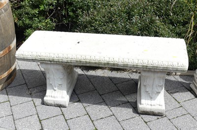 Lot 795 - A reconstituted stone garden twin pedestal...