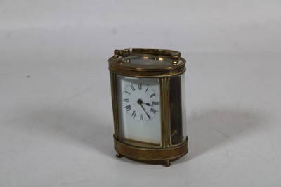 Lot 214 - A 20th-century lacquered brass cased carriage...