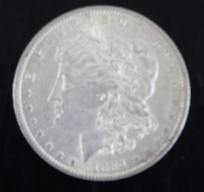 Lot 198 - United States of America, 1884 silver Morgan...