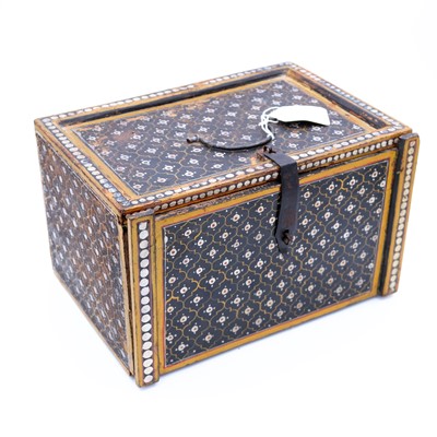 Lot 19 - A Tibetan polychrome painted wooden box, with...