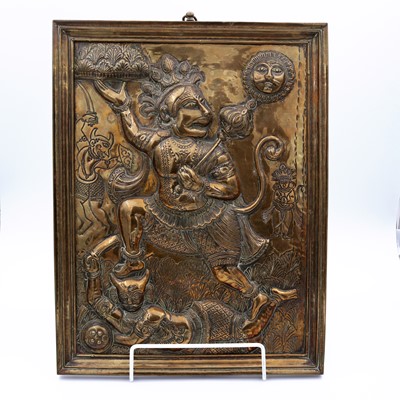 Lot 6 - An Indian brass devotional panel, repousse...