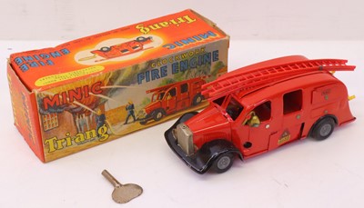 Lot 467 - Triang Minic Fire Engine in a red body with...