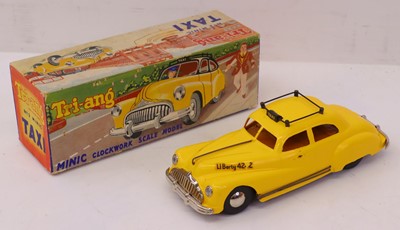 Lot 469 - Triang Minic Plastic and clockwork model of a...