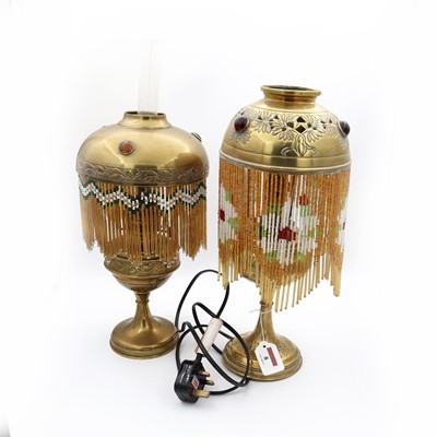 Lot 8 - An early 20th century brass table lamp, having...