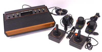 Lot 283 - Atari Video Game System containing a loose...