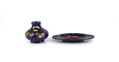 Lot 235 - A Moorcroft Clematis pattern pottery small...