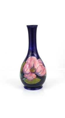 Lot 255 - A Moorcroft Pink Magnolia pattern pottery...