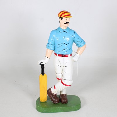 Lot 26 - A contemporary cast iron figure of a gentleman...