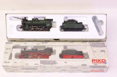 Lot 46 - A Piko HO scale boxed locomotive group, to...