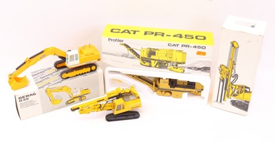 Lot 932 - Three various boxed construction and earth...