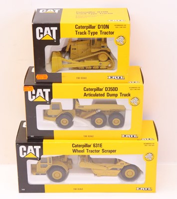 Lot 928 - An ERTL Caterpillar boxed earth-moving diecast...