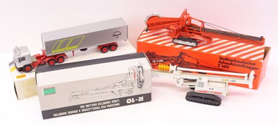 Lot 930 - A boxed earth-moving and road hauling diecast...