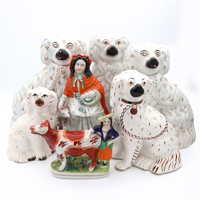 Lot 13 - A collection of Staffordshire figures, 19th...