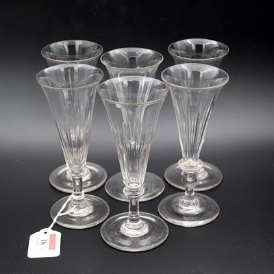 Lot 16 - A set of four 19th century champagne flutes,...