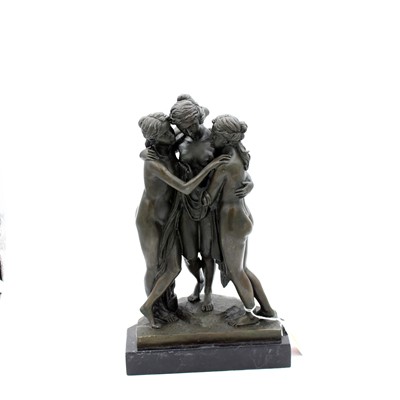 Lot 27 - A reproduction bronzed metal figure group of...