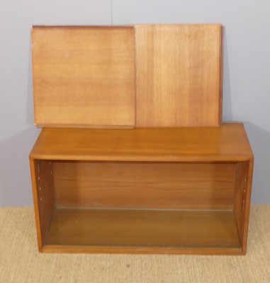 Lot 600 - A 1970s Ladderax teak corner wall shelf,...