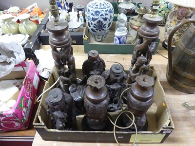 Lot 103 - A pair of African carved hardwood figural...