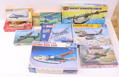 Lot 384 - A box containing a collection of plastic kits...