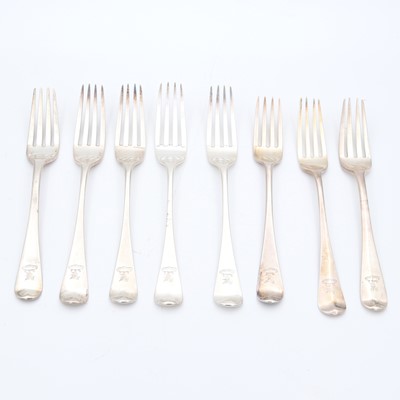 Lot 88 - A set of four George III silver table forks,...