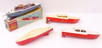 Lot 454 - Four Penguin clockwork boats, including a...