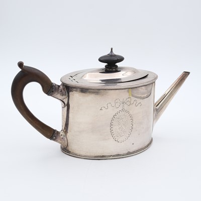 Lot 84 - A George III silver teapot, of elliptical form...