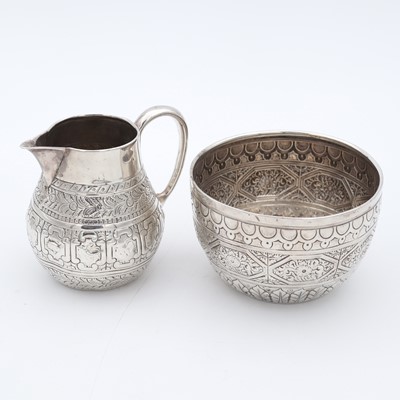 Lot 55 - A Victorian silver tea duo, comprising a sugar...