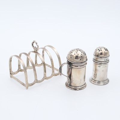 Lot 52 - A George V silver four division toast rack...