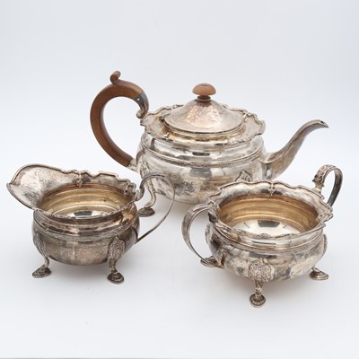 Lot 110 - A George VI silver three-piece tea set,...