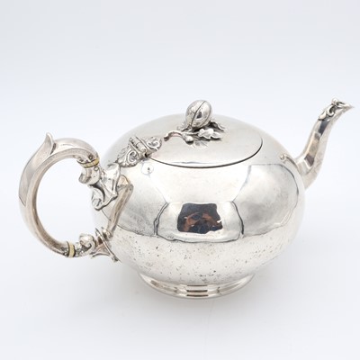 Lot 97 - A Victorian silver teapot, of melon shape to a...
