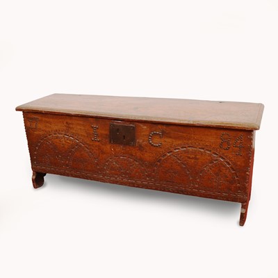 Lot 233 - A circa 1700 elm plank coffer, the hinged top...