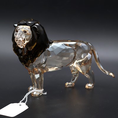 Lot 89 - A Swarovski Crystal Society figure 'Lion Akili'...