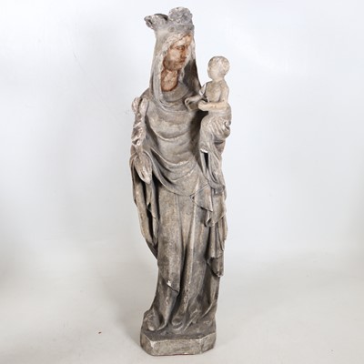 Lot 4 - A painted pottery figure of the 'Virgin and...