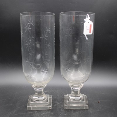 Lot 10 - A pair of reproduction glass storm lanterns,...