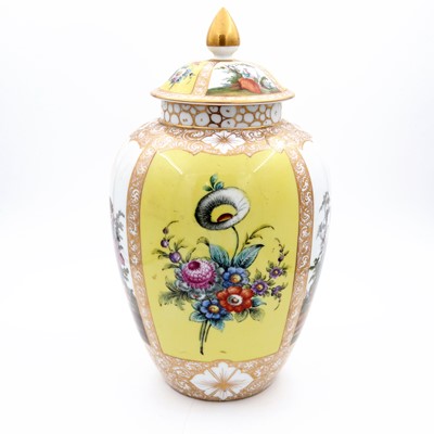 Lot 16 - A German porcelain vase and cover of balluster...