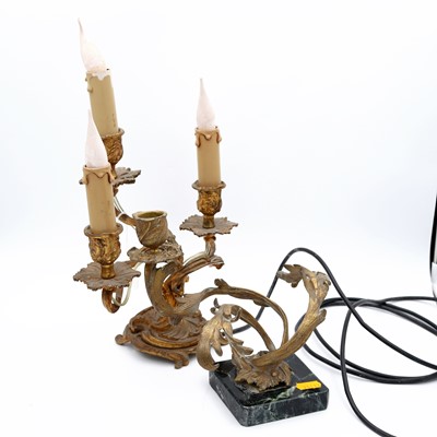 Lot 31 - An early 20th century gilt brass three-branch...