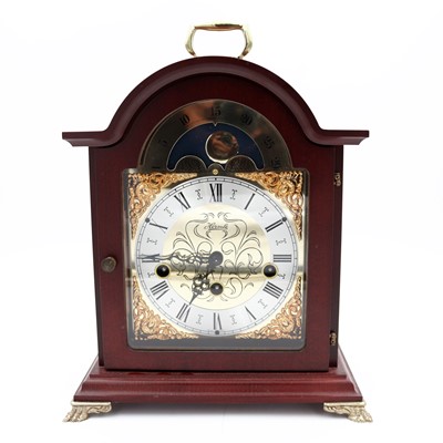 Lot 22 - A reproduction continental mahogany cased...