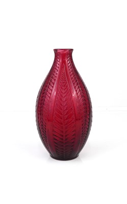 Lot 324 - Lalique - a contemporary 'Medusa' red glass...