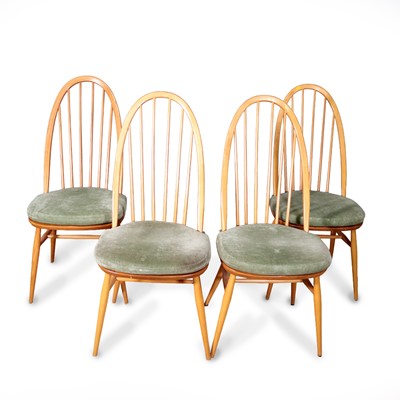 Lot 471 - A set of four Ercol blond elm and beech...