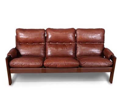Lot 486 - A 1970s Danish hardwood framed three seater...