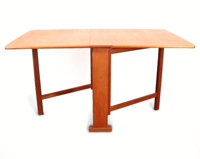 Lot 485 - A 1960s Danish teak drop-leaf dining table, of...
